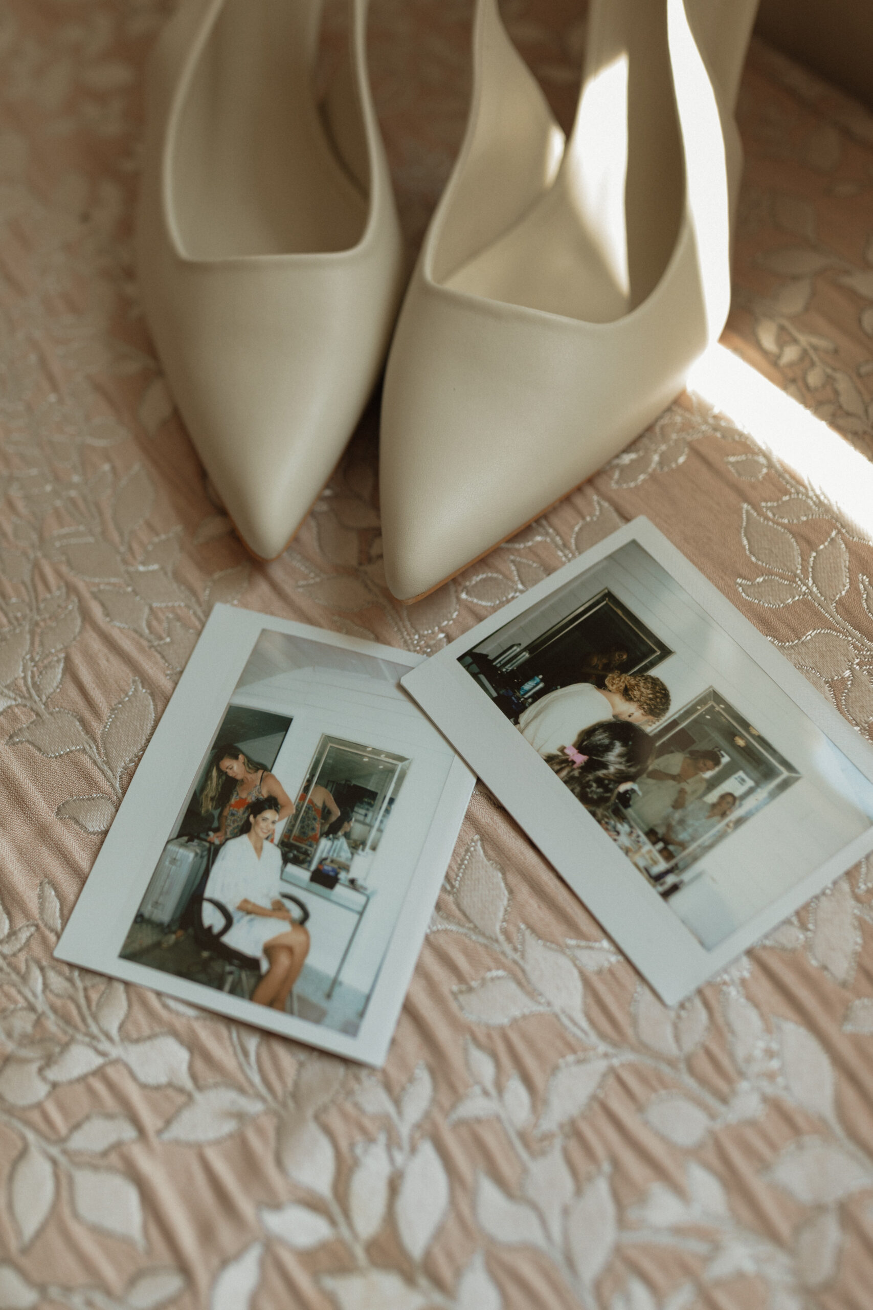 polaroid photos of bride getting ready for wedding at the New London Carriage House in PEI