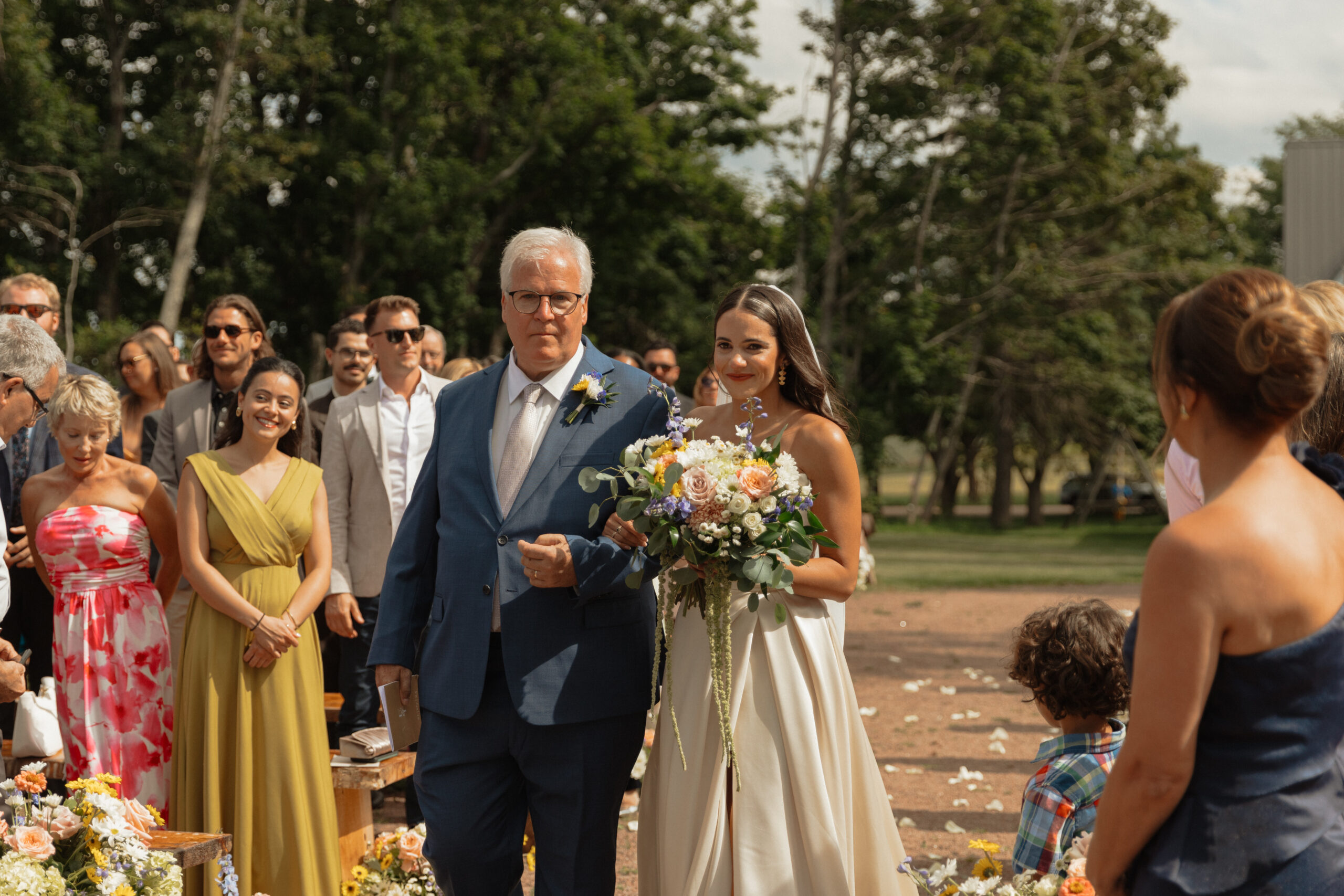 bride walking up the aisle with dad