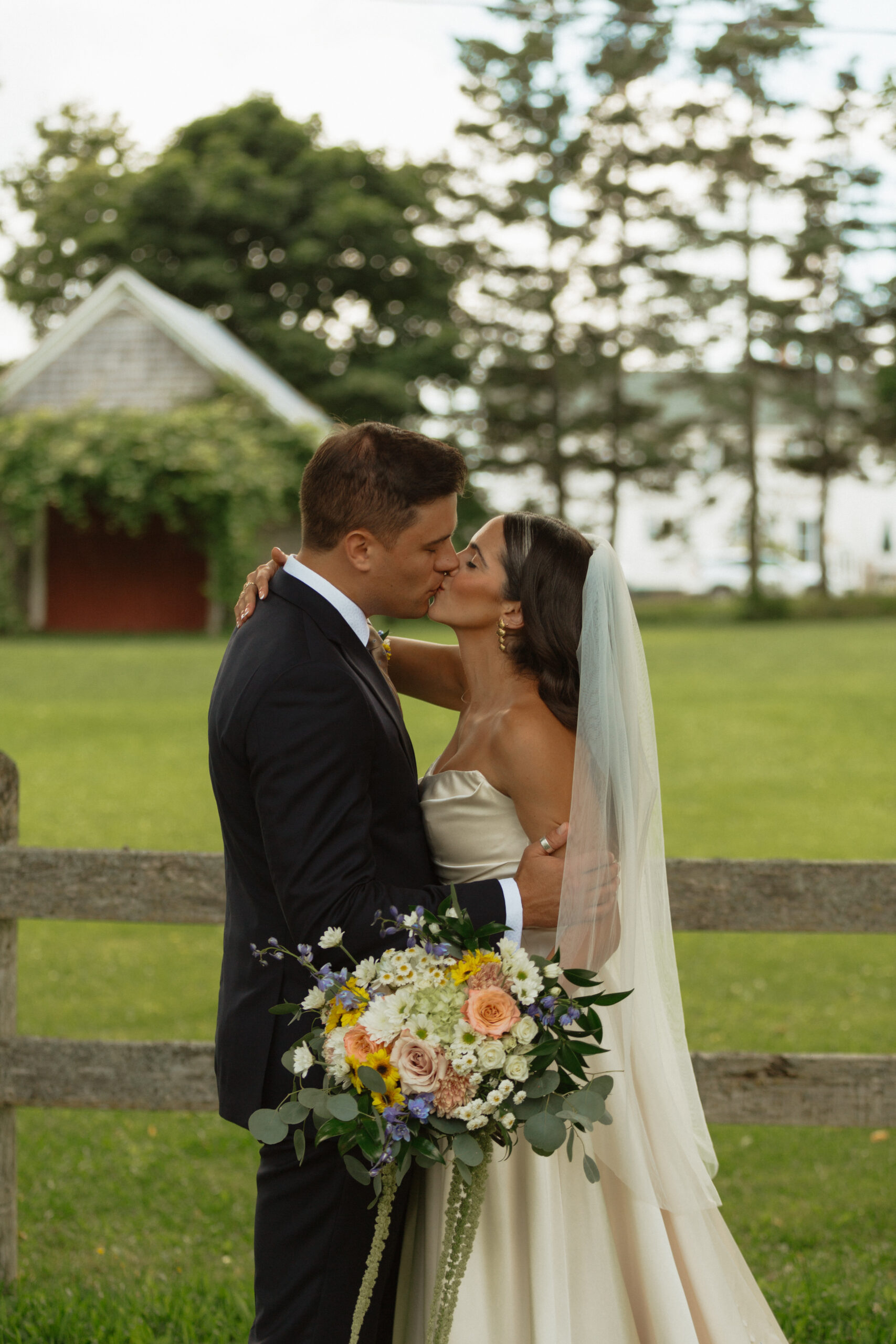 bride and groom kissing