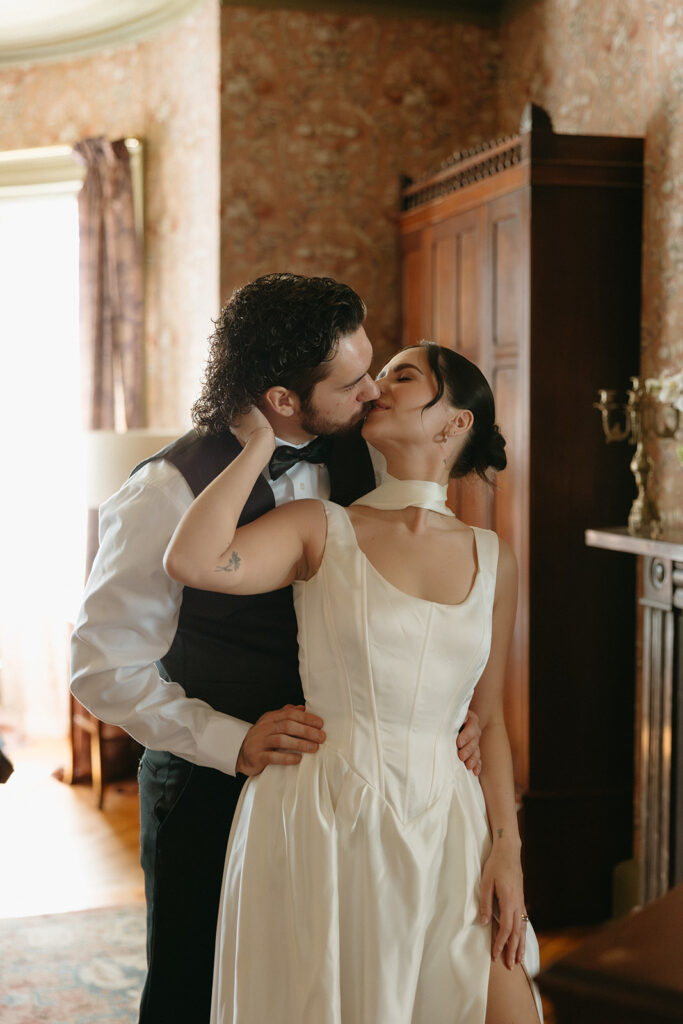 bride and groom kissing 